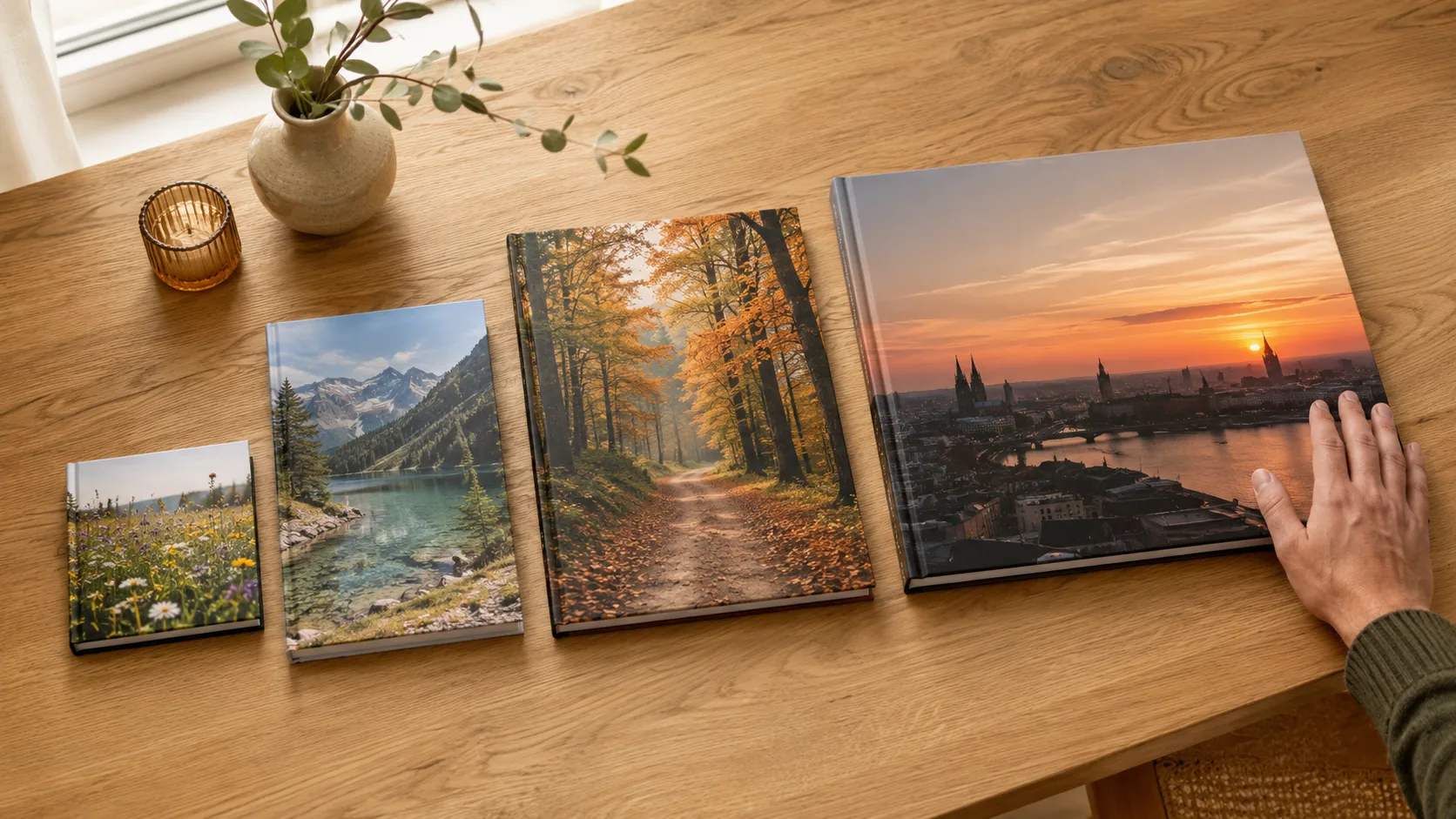 Fotobücher in vier Formaten von klein bis groß im Vergleich