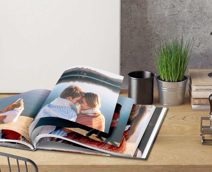 Fotobuch mit eigenen Fotos gestalten