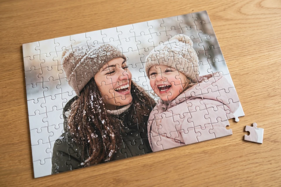 Fotopuzzle mit Foto einer Familie im Schnee
