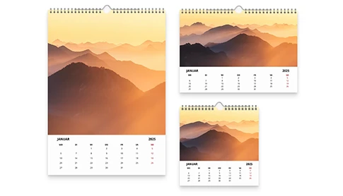 Wandkalender mit Berglandschaft im Abendlicht